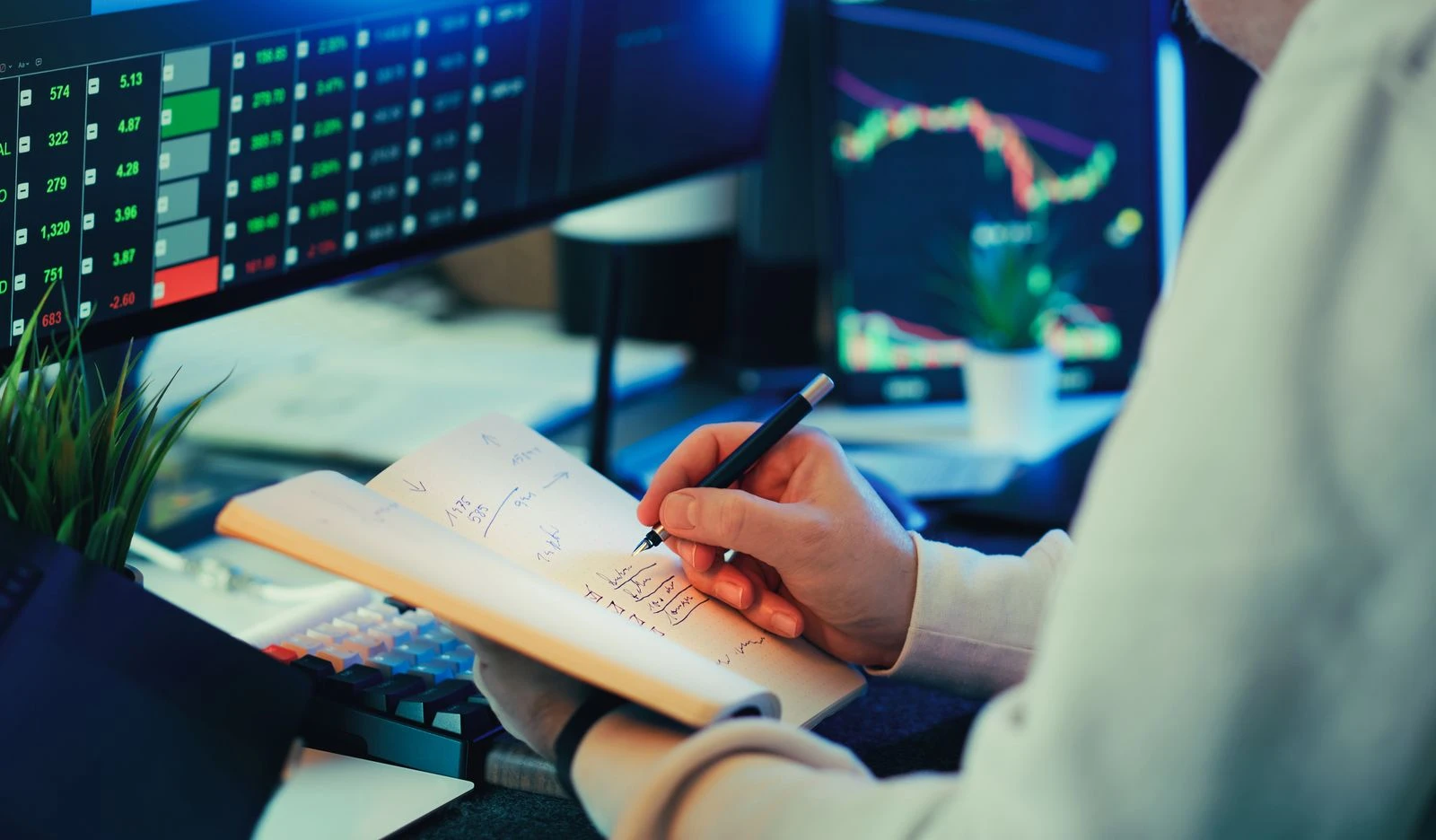 Fractional CFO reviewing live financial data across multiple screens