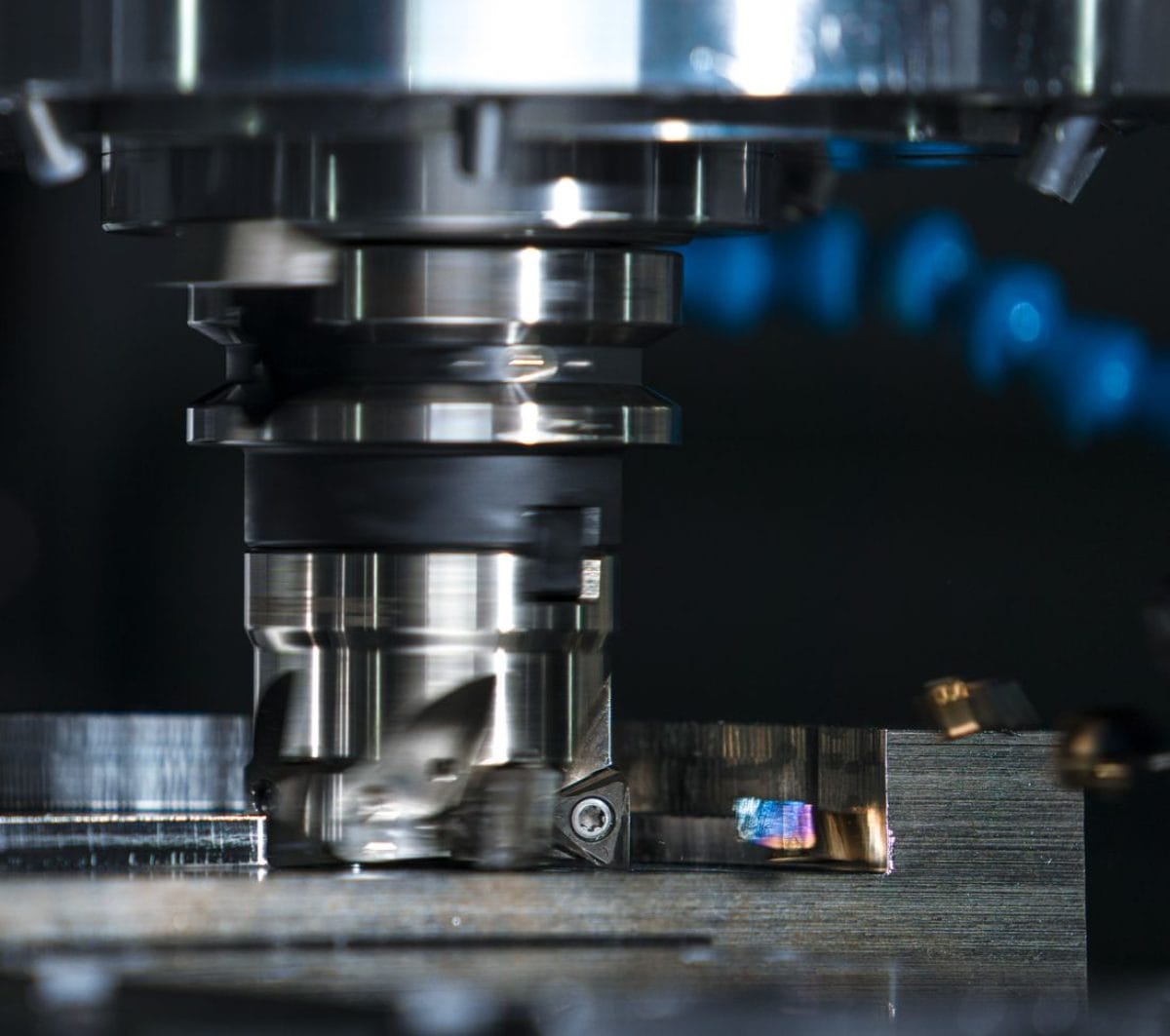 CNC work centre cutting a part against a released works order