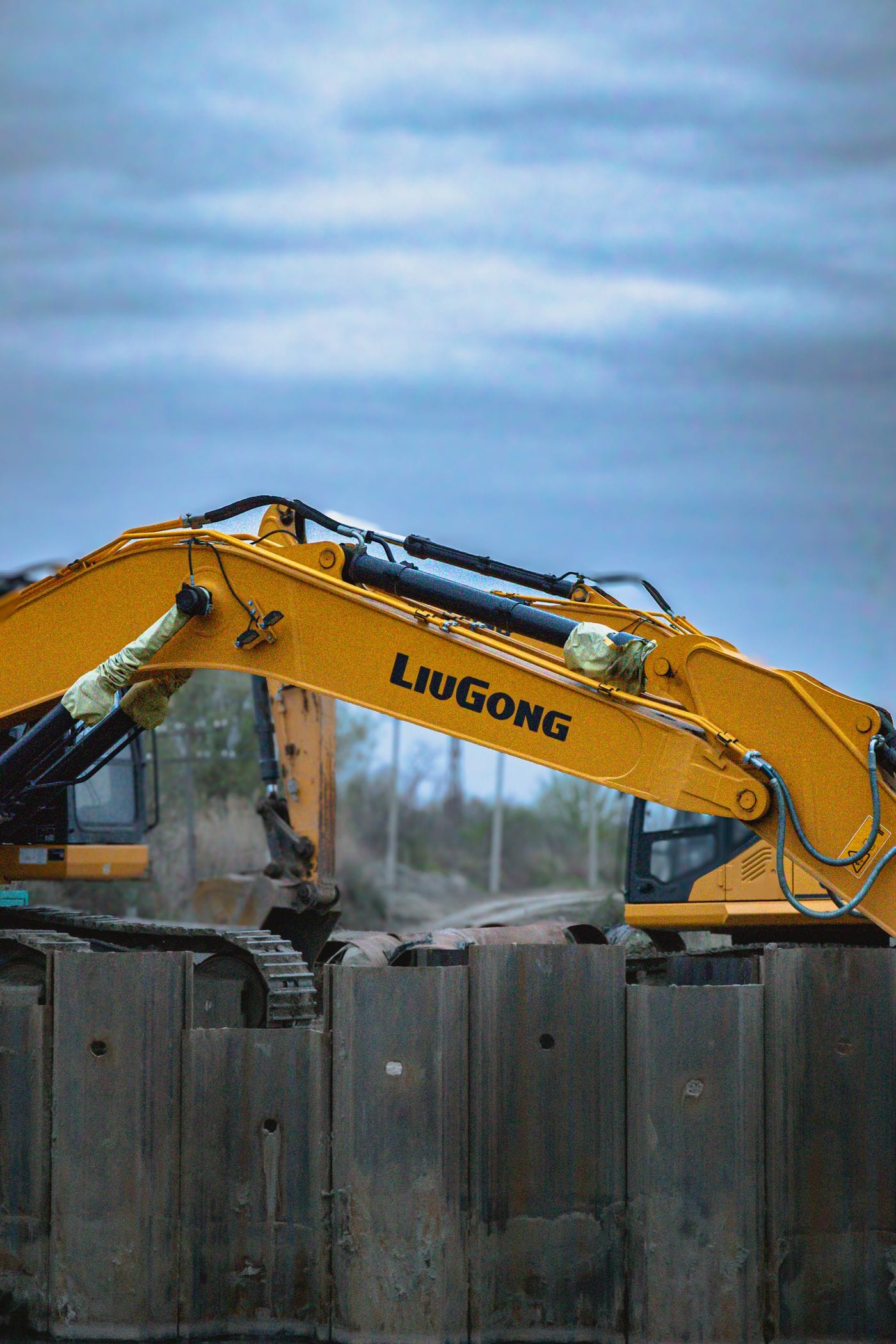 Rental excavators working on site with real-time availability tracking