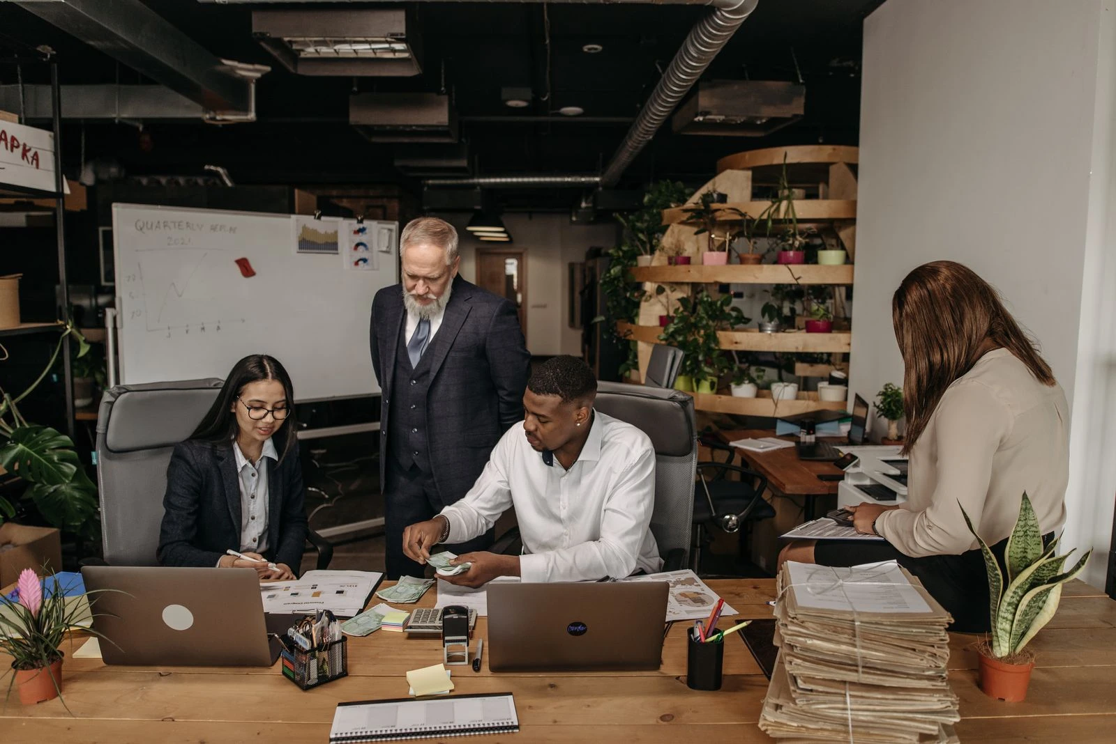 Index World accounting team working through a client file